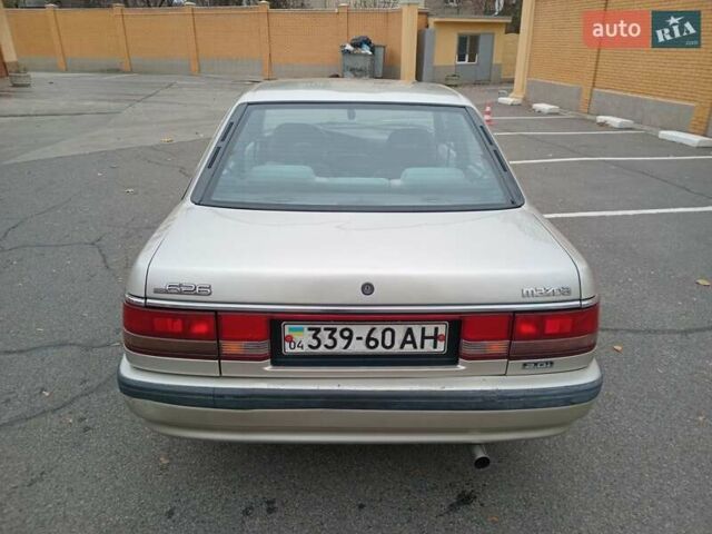 Серый Мазда 626, объемом двигателя 2 л и пробегом 449 тыс. км за 1300 $, фото 4 на Automoto.ua
