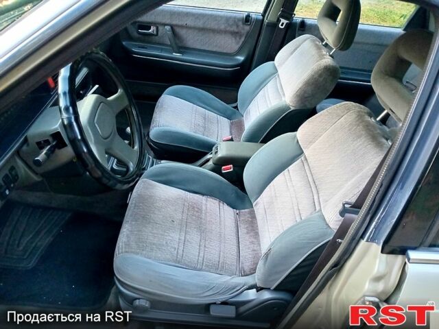 Серый Мазда 626, объемом двигателя 2 л и пробегом 447 тыс. км за 1300 $, фото 3 на Automoto.ua