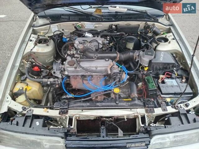 Серый Мазда 626, объемом двигателя 2 л и пробегом 449 тыс. км за 1300 $, фото 10 на Automoto.ua