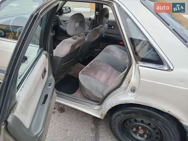 Серый Мазда 626, объемом двигателя 2 л и пробегом 449 тыс. км за 1300 $, фото 6 на Automoto.ua