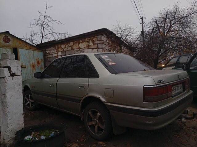 Серый Мазда 626, объемом двигателя 1.8 л и пробегом 594 тыс. км за 953 $, фото 6 на Automoto.ua