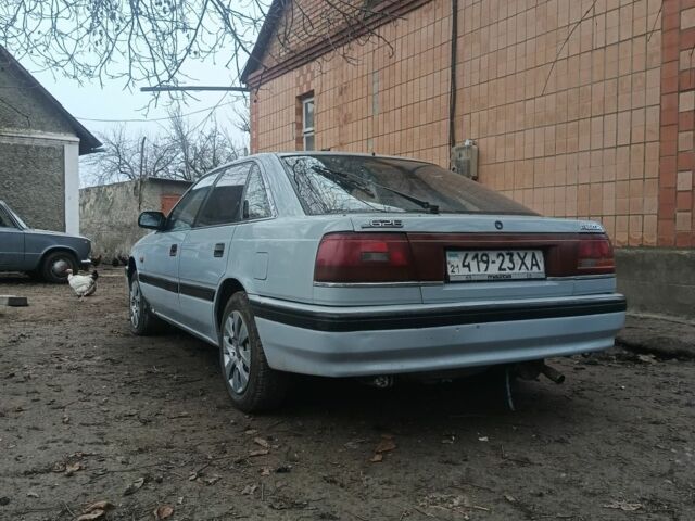 Серый Мазда 626, объемом двигателя 2 л и пробегом 650 тыс. км за 734 $, фото 1 на Automoto.ua