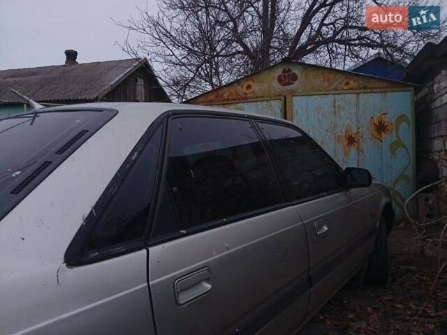 Серый Мазда 626, объемом двигателя 1.8 л и пробегом 594 тыс. км за 953 $, фото 3 на Automoto.ua