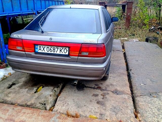 Серый Мазда 626, объемом двигателя 2 л и пробегом 558 тыс. км за 1500 $, фото 3 на Automoto.ua