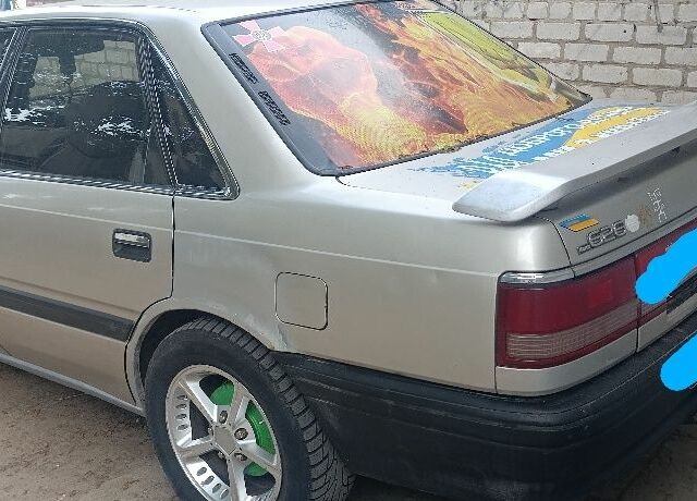 Серый Мазда 626, объемом двигателя 2 л и пробегом 400 тыс. км за 961 $, фото 5 на Automoto.ua