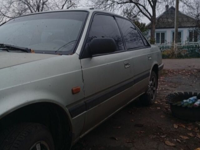 Серый Мазда 626, объемом двигателя 1.8 л и пробегом 594 тыс. км за 953 $, фото 1 на Automoto.ua