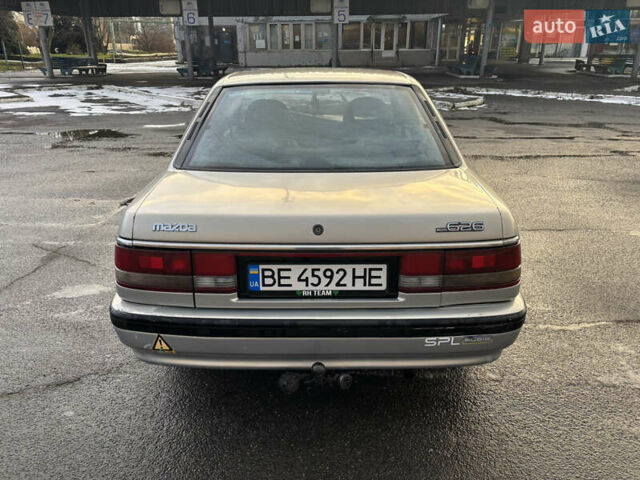 Сірий Мазда 626, об'ємом двигуна 2 л та пробігом 350 тис. км за 1450 $, фото 5 на Automoto.ua