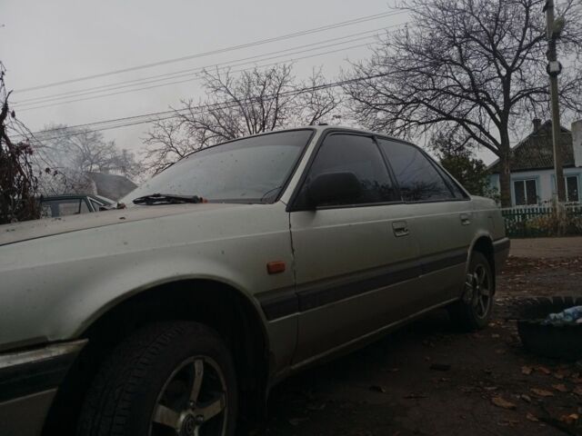 Серый Мазда 626, объемом двигателя 1.8 л и пробегом 594 тыс. км за 953 $, фото 3 на Automoto.ua