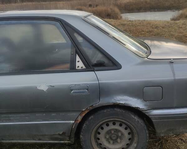 Сірий Мазда 626, об'ємом двигуна 2 л та пробігом 400 тис. км за 1271 $, фото 3 на Automoto.ua