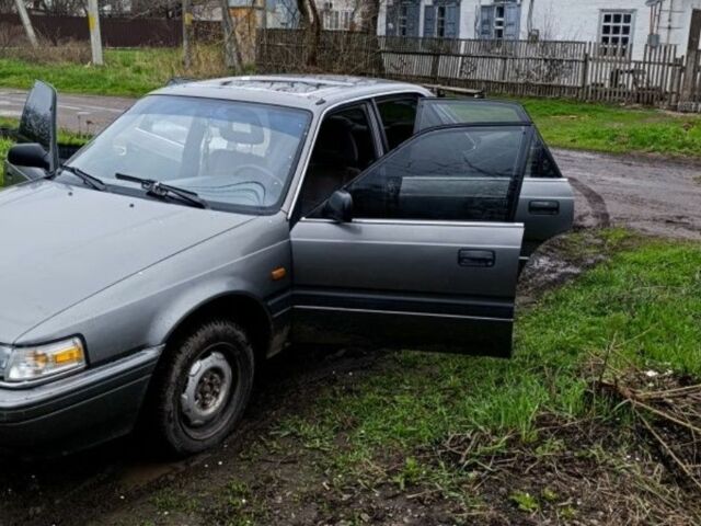 Сірий Мазда 626, об'ємом двигуна 2 л та пробігом 77 тис. км за 720 $, фото 6 на Automoto.ua