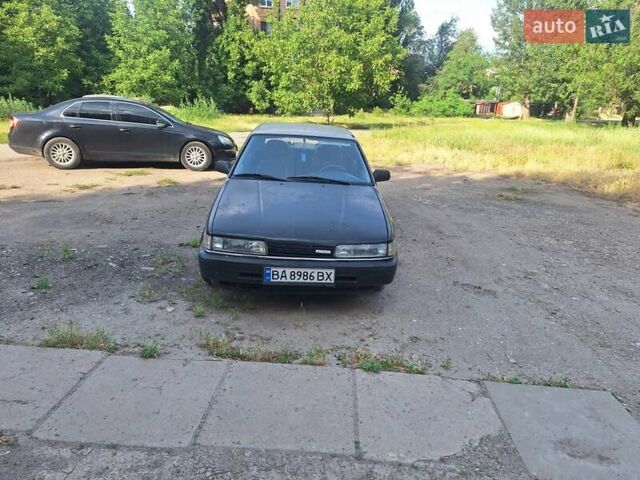 Сірий Мазда 626, об'ємом двигуна 1.8 л та пробігом 300 тис. км за 1600 $, фото 1 на Automoto.ua