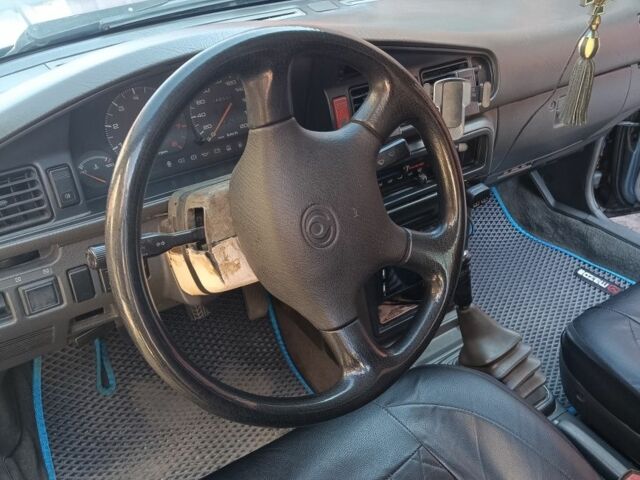 Серый Мазда 626, объемом двигателя 2 л и пробегом 348 тыс. км за 1300 $, фото 2 на Automoto.ua