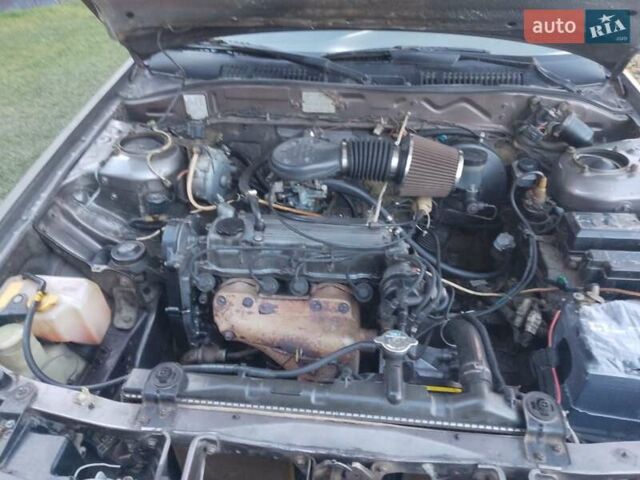 Серый Мазда 626, объемом двигателя 1.8 л и пробегом 330 тыс. км за 1500 $, фото 6 на Automoto.ua