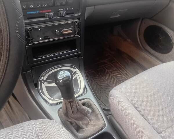 Серый Мазда 626, объемом двигателя 2 л и пробегом 404 тыс. км за 1300 $, фото 3 на Automoto.ua