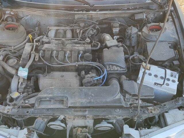 Серый Мазда 626, объемом двигателя 1.8 л и пробегом 390 тыс. км за 1200 $, фото 6 на Automoto.ua