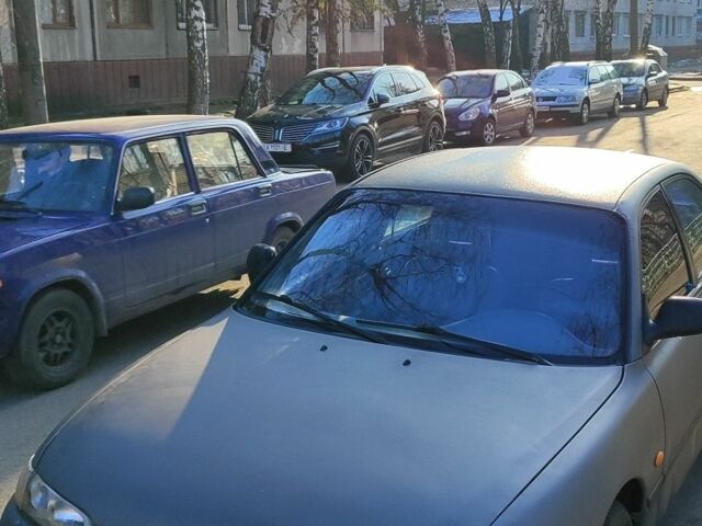 Серый Мазда 626, объемом двигателя 1.8 л и пробегом 390 тыс. км за 1200 $, фото 1 на Automoto.ua