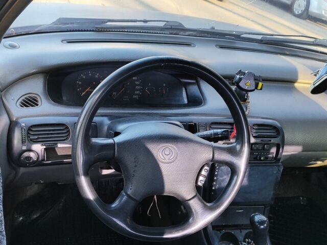 Серый Мазда 626, объемом двигателя 1.8 л и пробегом 390 тыс. км за 1200 $, фото 7 на Automoto.ua