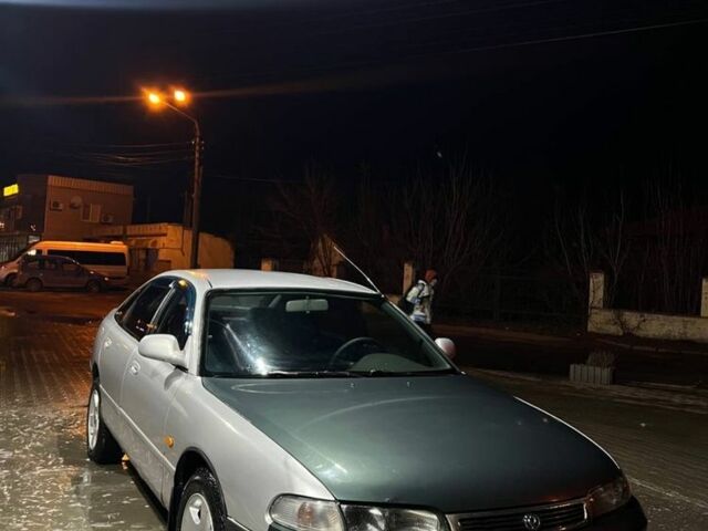 Серый Мазда 626, объемом двигателя 2 л и пробегом 307 тыс. км за 2399 $, фото 2 на Automoto.ua