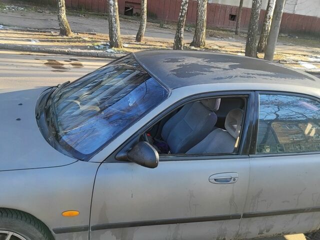 Серый Мазда 626, объемом двигателя 1.8 л и пробегом 390 тыс. км за 1200 $, фото 3 на Automoto.ua