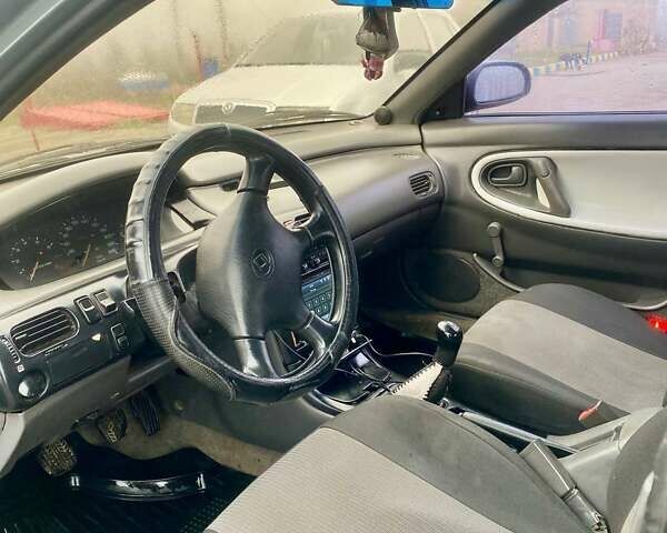 Серый Мазда 626, объемом двигателя 1.84 л и пробегом 450 тыс. км за 2050 $, фото 5 на Automoto.ua