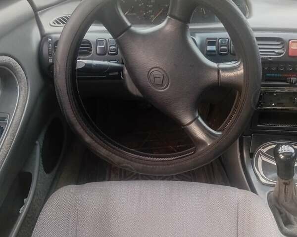 Серый Мазда 626, объемом двигателя 2 л и пробегом 404 тыс. км за 1300 $, фото 7 на Automoto.ua