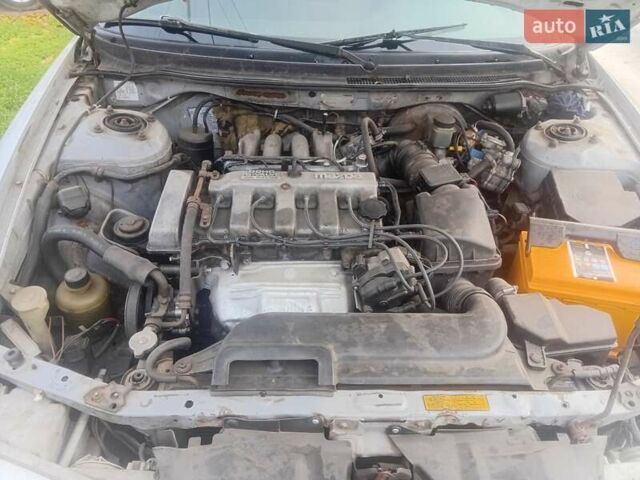 Серый Мазда 626, объемом двигателя 2 л и пробегом 404 тыс. км за 1300 $, фото 1 на Automoto.ua