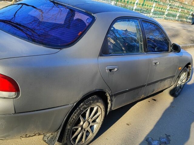 Серый Мазда 626, объемом двигателя 1.8 л и пробегом 390 тыс. км за 1200 $, фото 2 на Automoto.ua