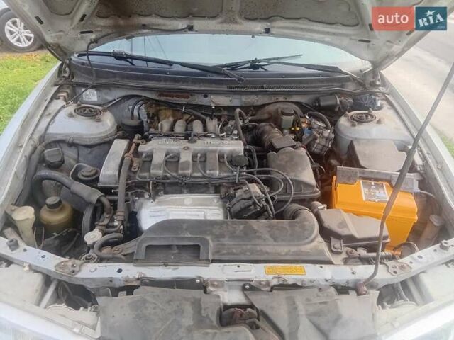 Серый Мазда 626, объемом двигателя 2 л и пробегом 404 тыс. км за 1300 $, фото 2 на Automoto.ua