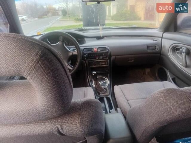 Серый Мазда 626, объемом двигателя 2 л и пробегом 404 тыс. км за 1300 $, фото 4 на Automoto.ua
