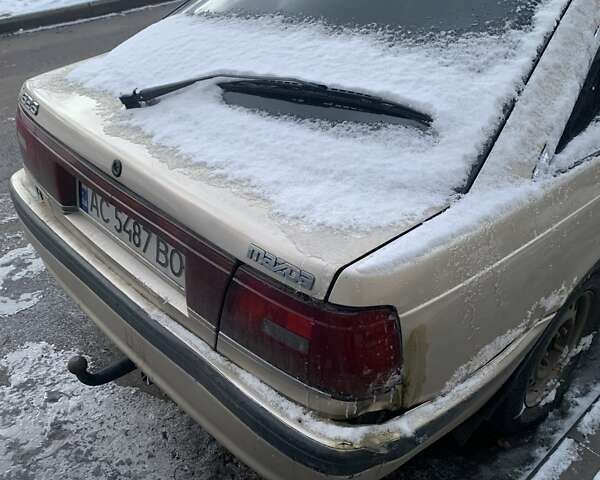 Серый Мазда 626, объемом двигателя 2.2 л и пробегом 450 тыс. км за 1200 $, фото 3 на Automoto.ua