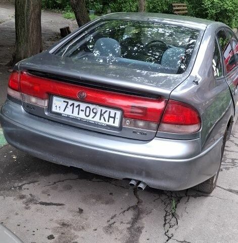 Серый Мазда 626, объемом двигателя 2.5 л и пробегом 300 тыс. км за 477 $, фото 1 на Automoto.ua