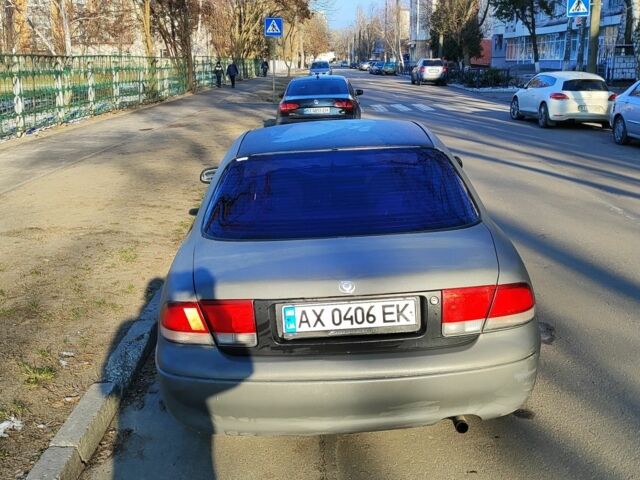 Серый Мазда 626, объемом двигателя 1.8 л и пробегом 390 тыс. км за 1200 $, фото 4 на Automoto.ua