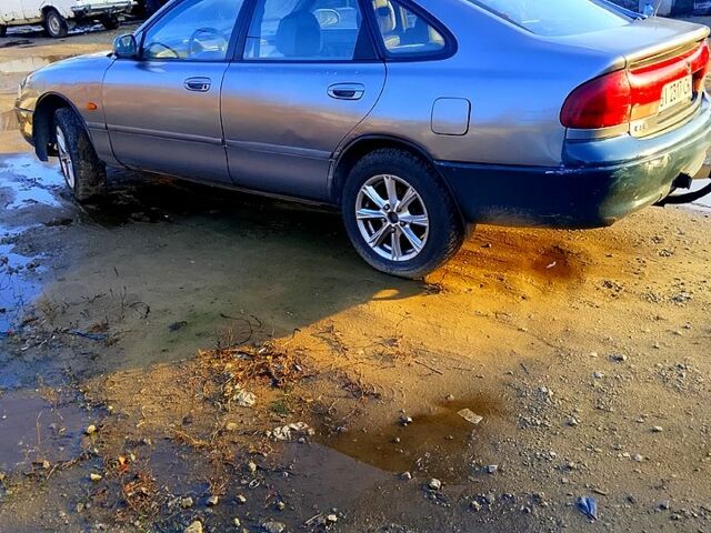 Серый Мазда 626, объемом двигателя 2 л и пробегом 300 тыс. км за 1650 $, фото 1 на Automoto.ua