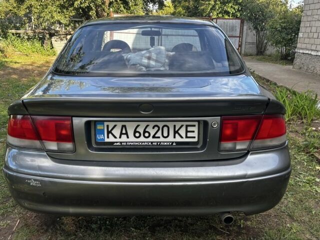 Серый Мазда 626, объемом двигателя 2 л и пробегом 340 тыс. км за 2000 $, фото 2 на Automoto.ua