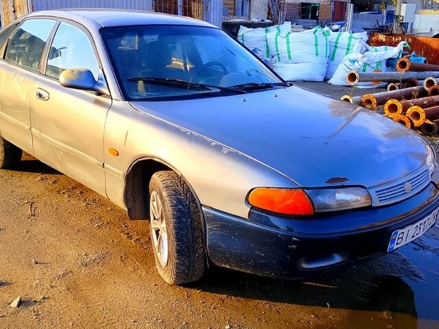 Серый Мазда 626, объемом двигателя 2 л и пробегом 300 тыс. км за 1650 $, фото 5 на Automoto.ua