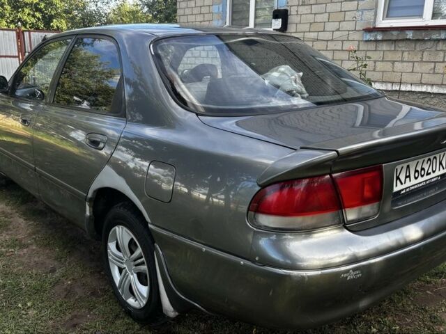 Серый Мазда 626, объемом двигателя 2 л и пробегом 340 тыс. км за 2000 $, фото 1 на Automoto.ua