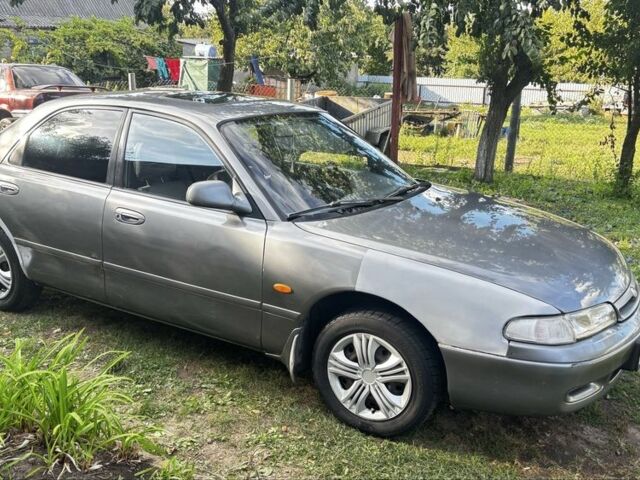 Серый Мазда 626, объемом двигателя 2 л и пробегом 340 тыс. км за 2000 $, фото 4 на Automoto.ua