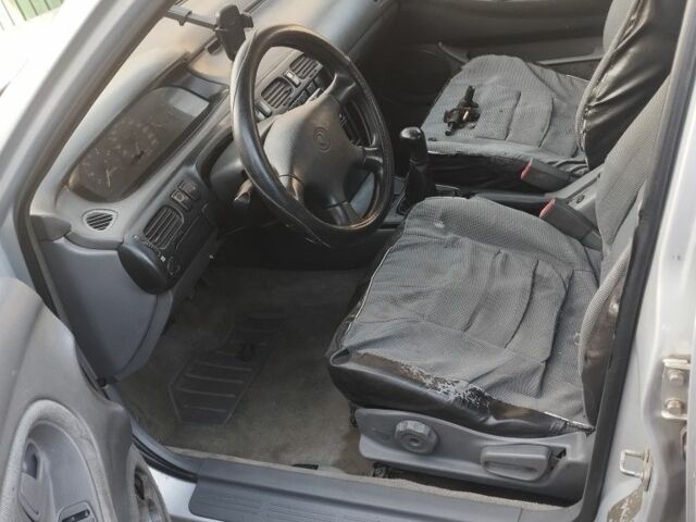 Серый Мазда 626, объемом двигателя 2 л и пробегом 200 тыс. км за 1950 $, фото 5 на Automoto.ua