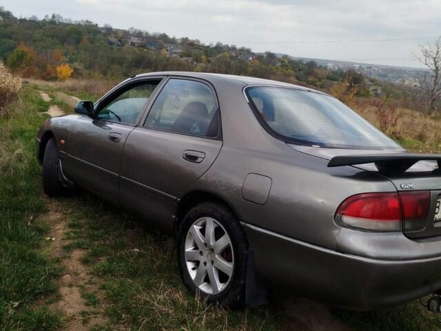 Серый Мазда 626, объемом двигателя 2 л и пробегом 390 тыс. км за 1950 $, фото 3 на Automoto.ua