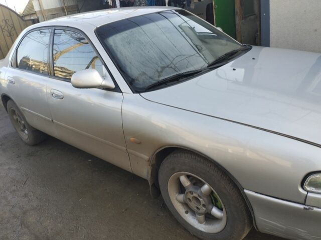 Серый Мазда 626, объемом двигателя 2 л и пробегом 200 тыс. км за 1950 $, фото 2 на Automoto.ua