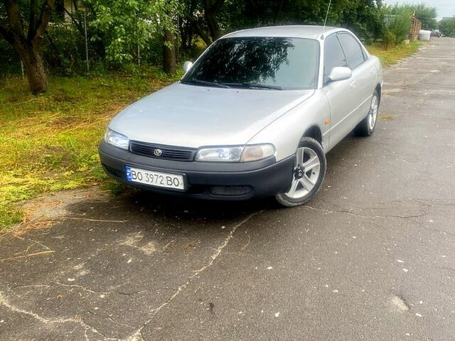 Серый Мазда 626, объемом двигателя 2 л и пробегом 240 тыс. км за 1999 $, фото 1 на Automoto.ua