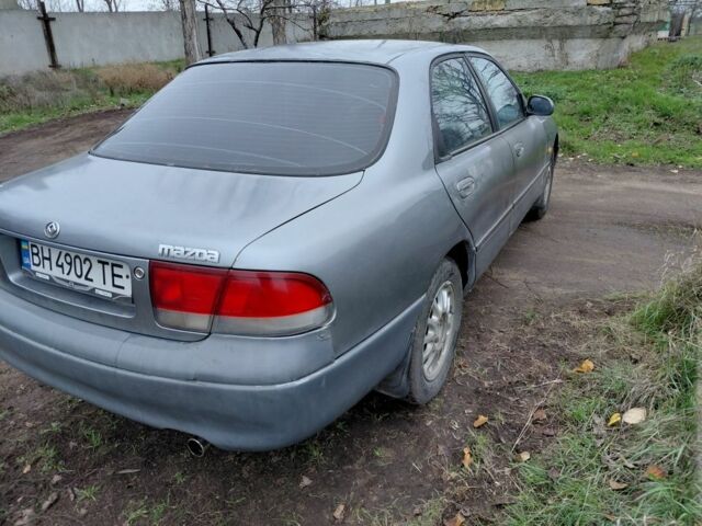 Серый Мазда 626, объемом двигателя 2 л и пробегом 297 тыс. км за 1700 $, фото 2 на Automoto.ua