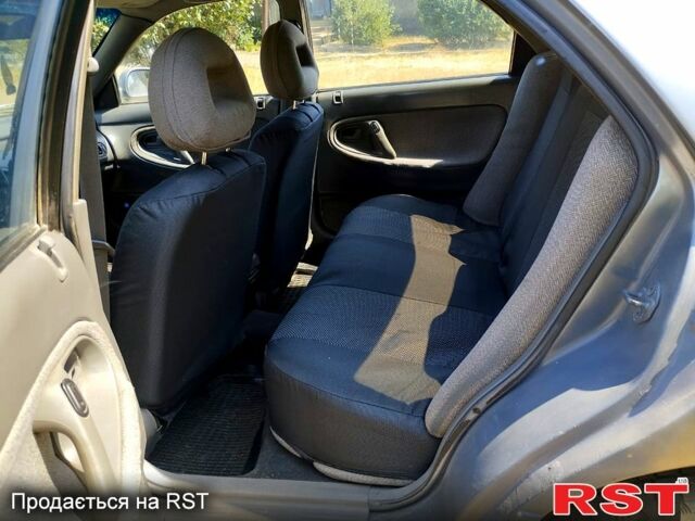 Серый Мазда 626, объемом двигателя 2 л и пробегом 297 тыс. км за 1600 $, фото 2 на Automoto.ua