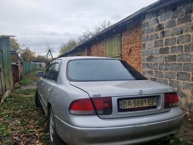 Серый Мазда 626, объемом двигателя 2 л и пробегом 422 тыс. км за 3000 $, фото 1 на Automoto.ua