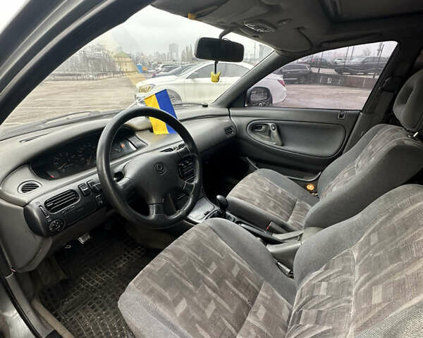 Серый Мазда 626, объемом двигателя 2.5 л и пробегом 250 тыс. км за 1500 $, фото 8 на Automoto.ua