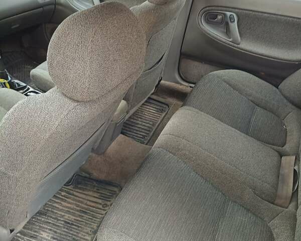 Серый Мазда 626, объемом двигателя 1.99 л и пробегом 350 тыс. км за 1350 $, фото 2 на Automoto.ua