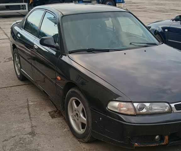 Серый Мазда 626, объемом двигателя 2 л и пробегом 312 тыс. км за 850 $, фото 1 на Automoto.ua