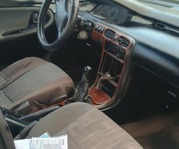 Серый Мазда 626, объемом двигателя 2 л и пробегом 312 тыс. км за 850 $, фото 9 на Automoto.ua