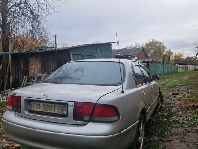 Серый Мазда 626, объемом двигателя 2 л и пробегом 422 тыс. км за 3000 $, фото 2 на Automoto.ua