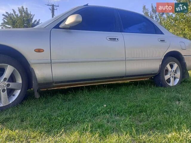 Серый Мазда 626, объемом двигателя 1.8 л и пробегом 230 тыс. км за 2500 $, фото 1 на Automoto.ua